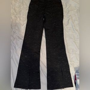 brand new black with white pattern flare pants with slit at bottom